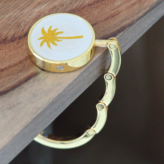Golden Bag Hook with Palm Design - hooked DXB