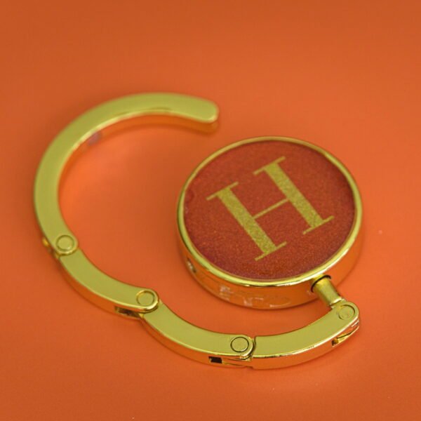 Purse hook initial