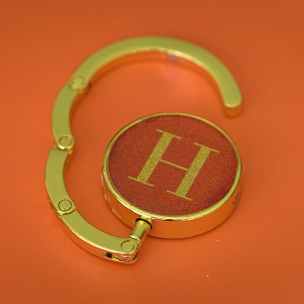 Purse hook initial